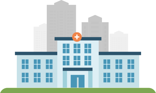 A big hospital with a city in the background